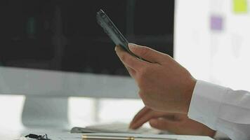 Financial analysts analyze business financial reports on a digital tablet planning investment project during a discussion at a meeting of corporate showing the results of their successful teamwork. video