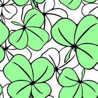 seamless asymmetric pattern of clover leaves in green and white colors and black contouros, design, texture photo