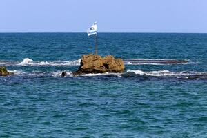 The blue and white flag of Israel with the six-pointed Star of David. photo