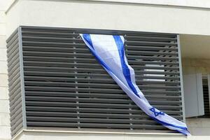 The blue and white flag of Israel with the six-pointed Star of David. photo