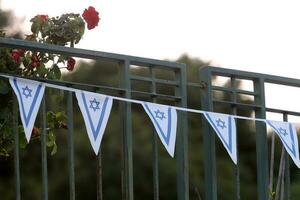 The blue and white flag of Israel with the six-pointed Star of David. photo