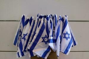 The blue and white flag of Israel with the six-pointed Star of David. photo