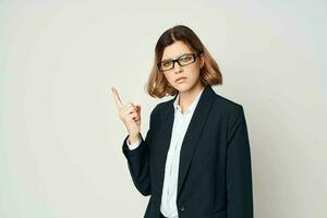 woman in suit gesturing with hand official businesswoman office work photo