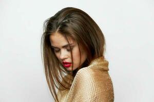 A portrait of a woman with a scarf Eyes closed, the model lowered her head down elegant style photo