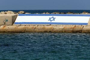 The blue and white flag of Israel with the six-pointed Star of David. photo