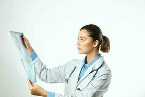 nurse white coat x-ray diagnostics hospital light background photo