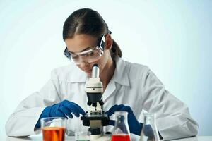 woman laboratory assistant microscope research technology science photo