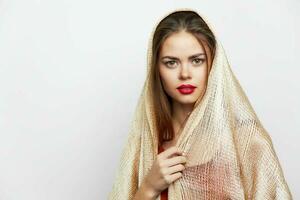 A woman with a shawl Ethnicity is luxury red lips photo