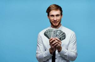man with money in the hands of businessman emotions wealth photo