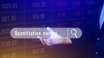 Quantitative easing written in search bar with the financial data visible on background, Quantitative easing concept stock Market online marketing photo
