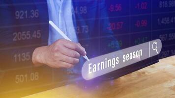 Earnings season Hand touching of written in search bar with the financial data visible in the background,  Reports Stock Market Ticker Words photo