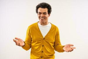 Studio shot portrait of happy smiling multiracial man. Man is looking at camera and smiling. photo