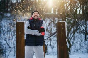 Boxer is training at the park in the winter. He is working on his fitness. photo