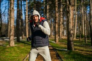 Boxer is training at the park in the winter. He is working on his fitness. photo