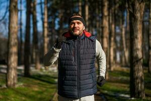 Boxer is training at the park in the winter. He is working on his fitness. photo