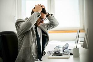 A business man working in his office photo