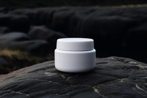 White and blank, unbranded cosmetic cream jar standing outdoors, on the rocks. Skin care product presentation. Skincare, beauty and spa. Jar with copy space, moisturizer. . photo