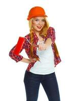 Funny girl in a helmet with roller in hand it is isolated on the white photo