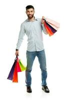 Man holding shopping bags. Christmas and holidays concept photo