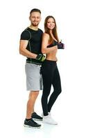 Sport man and woman after fitness exercise with a finger up on the white photo
