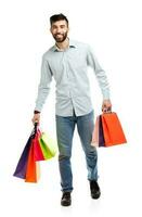 Handsome man holding shopping bags photo