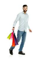 Man holding shopping bags. Christmas and holidays concept photo