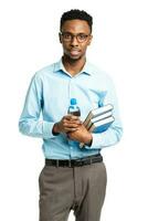 Happy african american college student with books and bottle of water in his hands standing on white photo