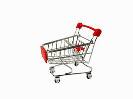 An empty grocery cart from a supermarket on a white, isolated background. Online shopping for buyers. photo