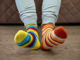 Strange Socks Day. Lonely Sock Day. The social problem of bullying. Strange socks as a symbol of Down syndrome photo