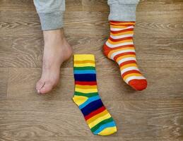 Strange Socks Day. Lonely Sock Day. The social problem of bullying. Strange socks as a symbol of Down syndrome photo