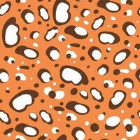 Leopard skin seamless pattern. Cartoon jaguar spots print design. Hand drawn leopard print. Wild orange vector illustration. Graphic leopard shapes pattern texture background.