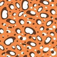 Leopard skin seamless pattern. Cartoon jaguar spots print design. Hand drawn leopard print. Wild orange vector illustration. Graphic leopard shapes pattern texture background.