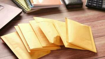 Yellow paper bubble envelope on table video