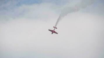 KAZAN, RUSSIAN FEDERATION, JUNE 15 - Absolute world champion in aeroplane sports Svetlana Kapanina on sports plane Extra 330LX RA 1758G performs aerobatics video