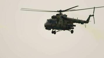 NOVOSIBIRSK, RUSSIA JUNE 17, 2020 - Military helicopter Mi 8 flies in the sky. Tolmachevo International Airport, Novosibirsk video