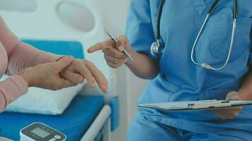 Doctor use stethoscope, checking up heart beat, lunch of auscultation in doctor office at hospital. Patient worker has to get medical checkup every year for her health or medical checkup cardiologist video