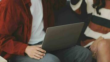 Financial analysts analyze business financial reports on a digital tablet planning investment project during a discussion at a meeting of corporate showing the results of their successful teamwork. video