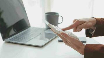 Financial analysts analyze business financial reports on a digital tablet planning investment project during a discussion at a meeting of corporate showing the results of their successful teamwork. video