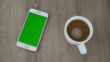 Smart phone green screen with coffee video