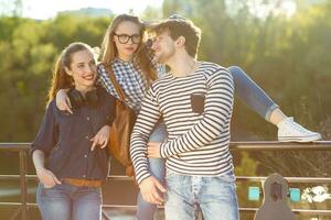 Smiling friends having fun outdoors photo