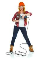 Female construction worker in a hard hat with angle grinder over white photo