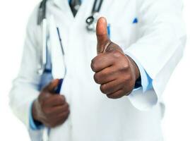 Doctor with finger up on white photo