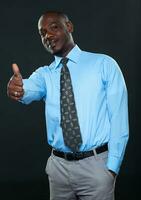 Young successful Businessman Showing Thumb Up photo