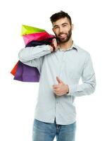 Man holding shopping bags. Christmas and holidays concept photo