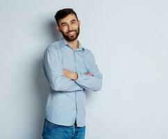 A young bearded man smiling photo