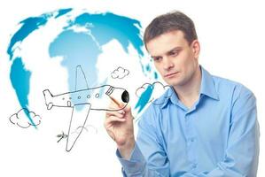 Businessman drawing plane photo