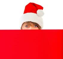 Christmas girl with red placard on white photo