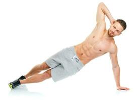 Sport attractive man doing fitness exercises on the white photo