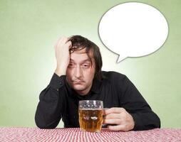 Drunk man with blank speech bubble photo