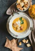 Pumpkin soup served photo